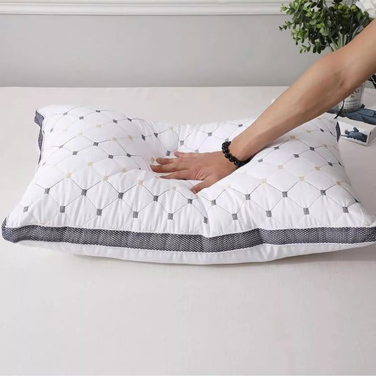 Hand pressing SouthernSoft Hotel Pillow to demonstrate ultra-soft, supportive microfibre fill